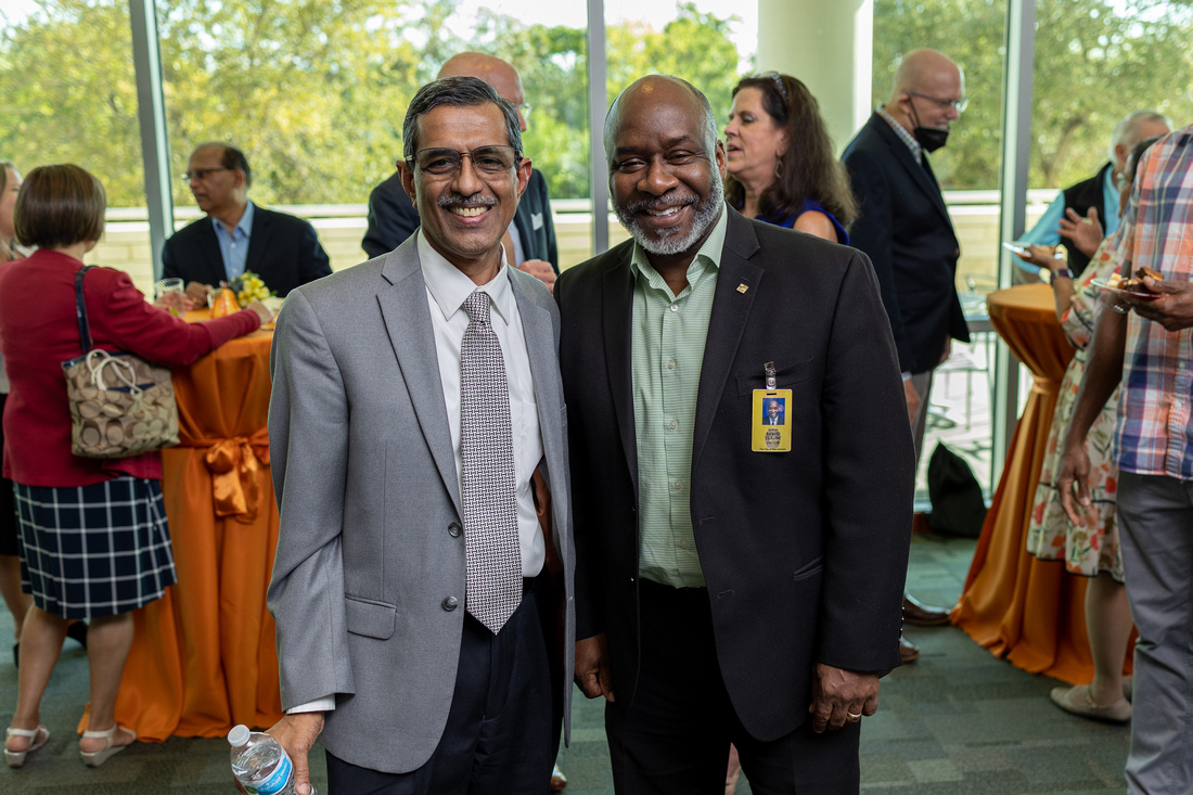 Dr. Vasan Ramachandran with a peer at SPH event